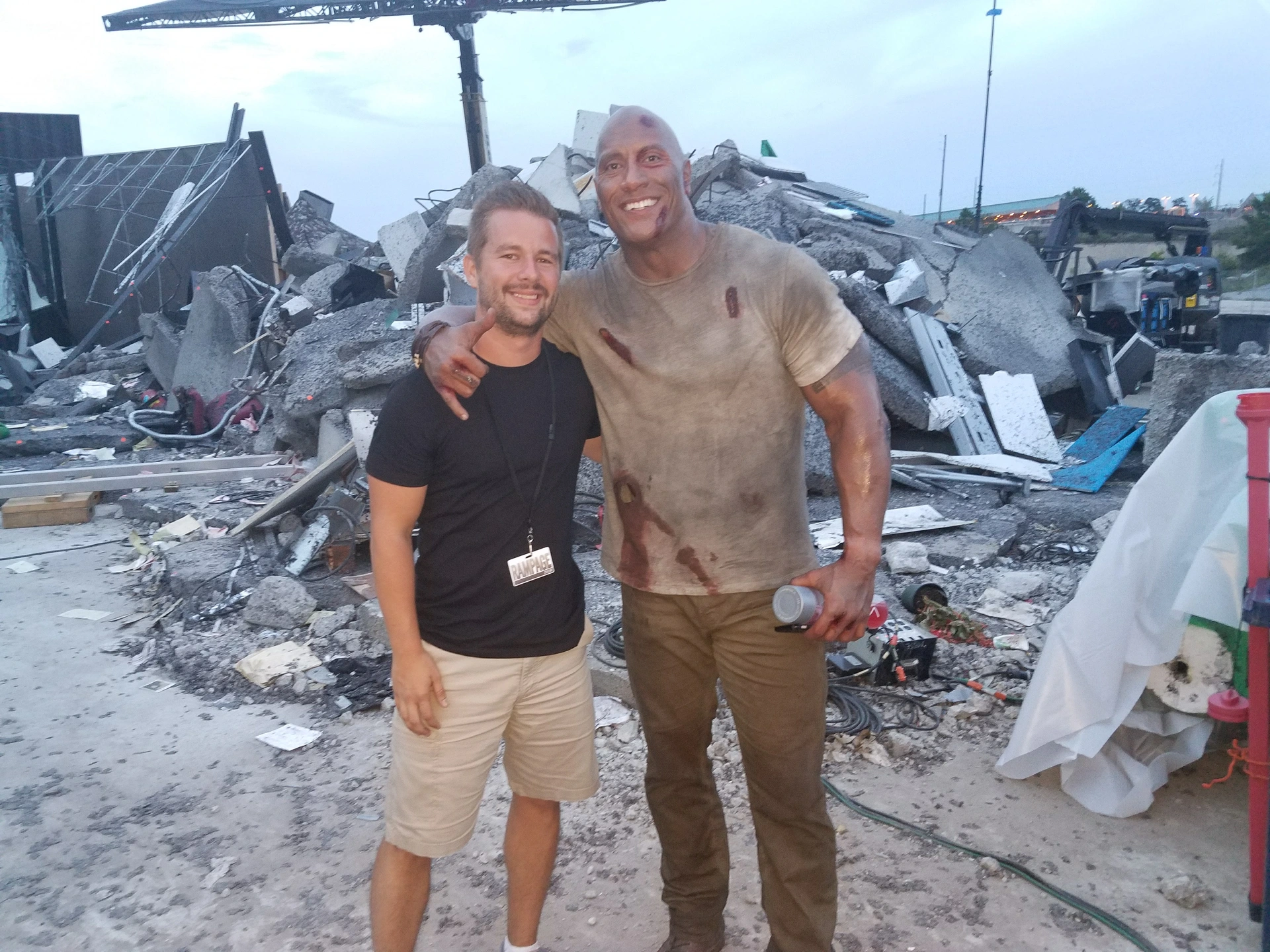 Paul Kelly teaching Dwayne Johnson sign language